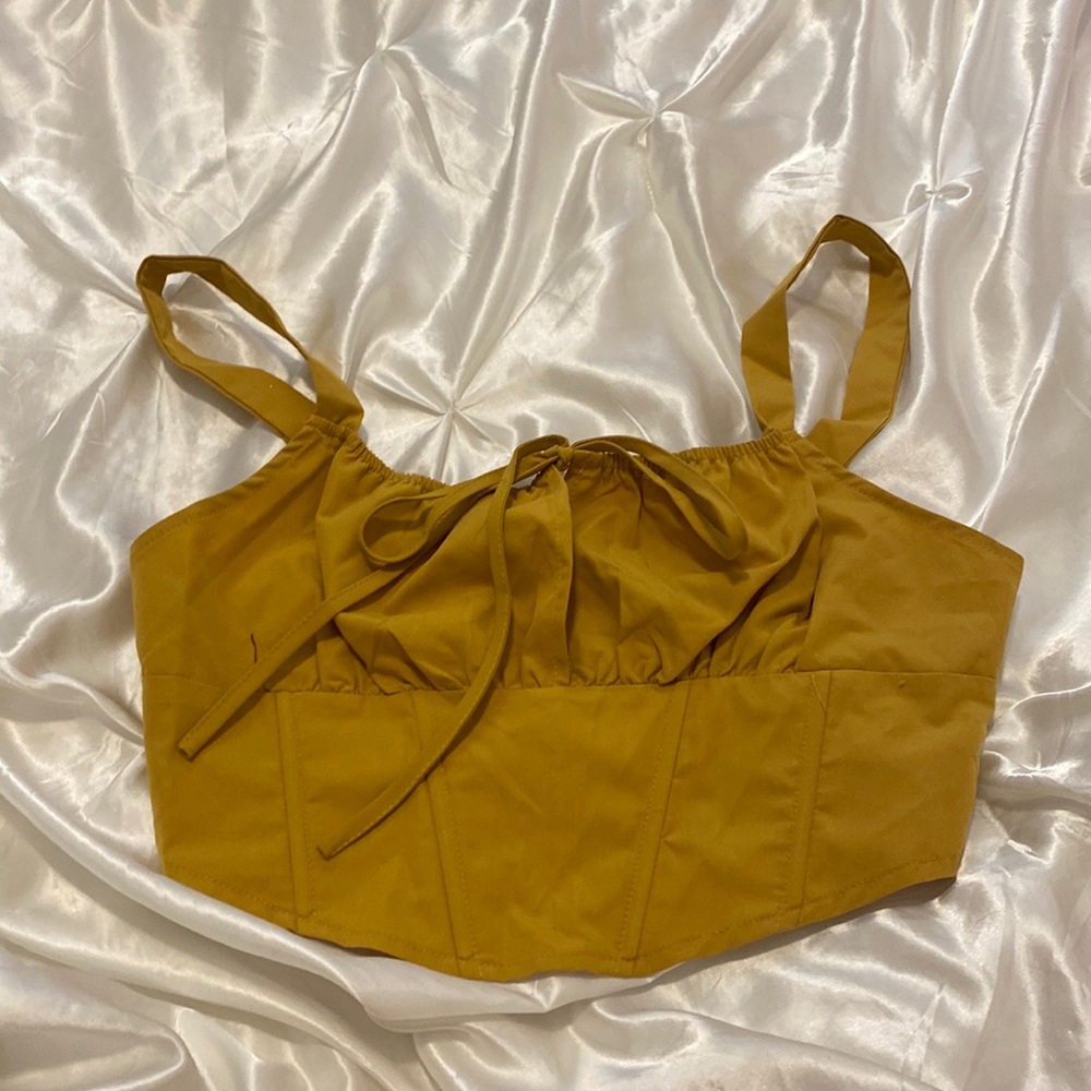 Never warn mustard yellow top